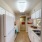 walk through kitchen with bright lighting