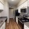 Stainless Appliance Package in well lit kitchen